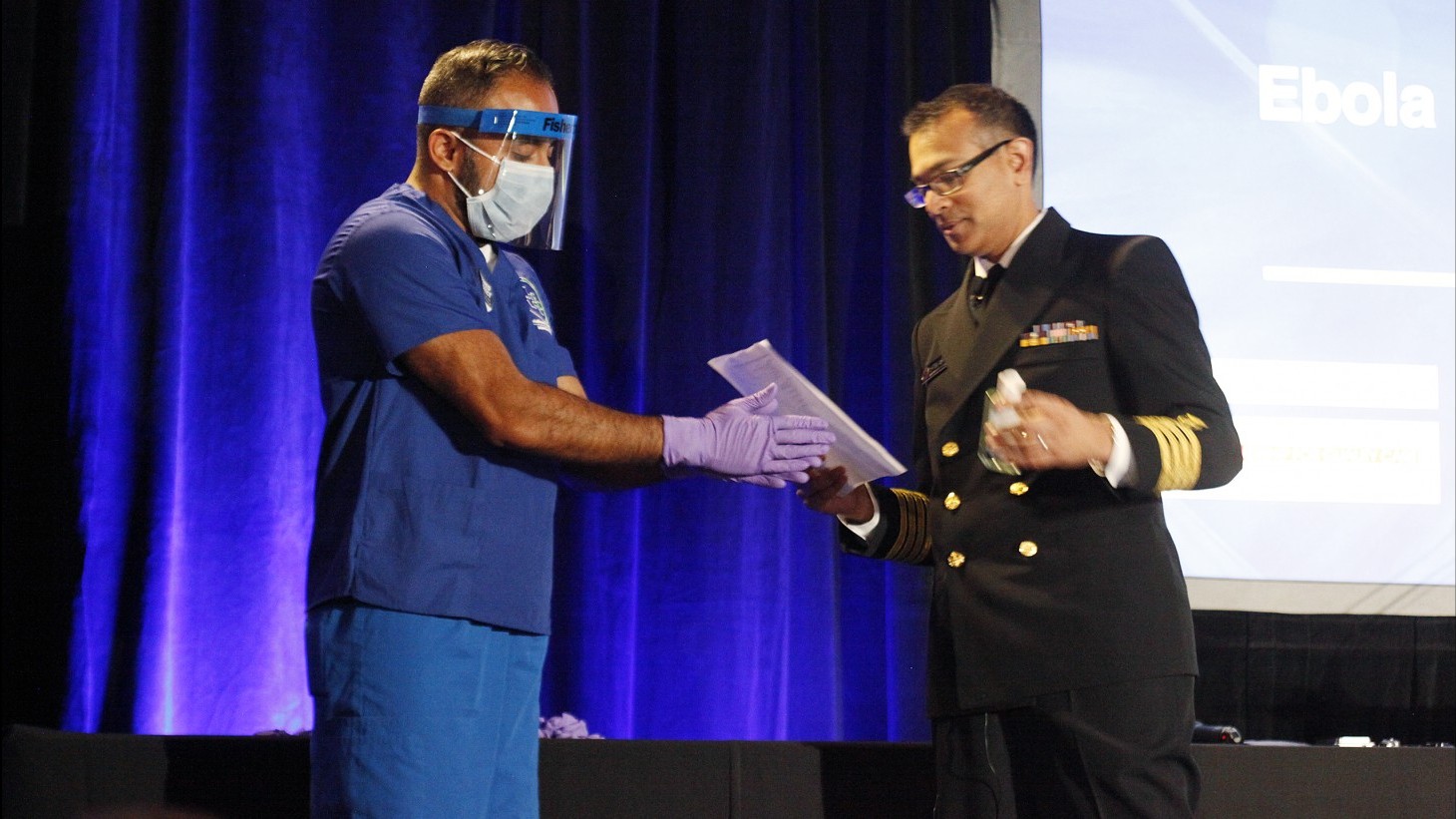 Nurse and CDC official at ebola safety training 