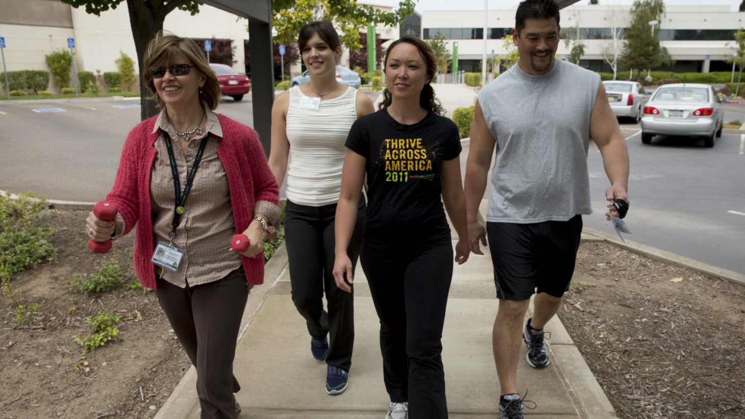 Four people walking together