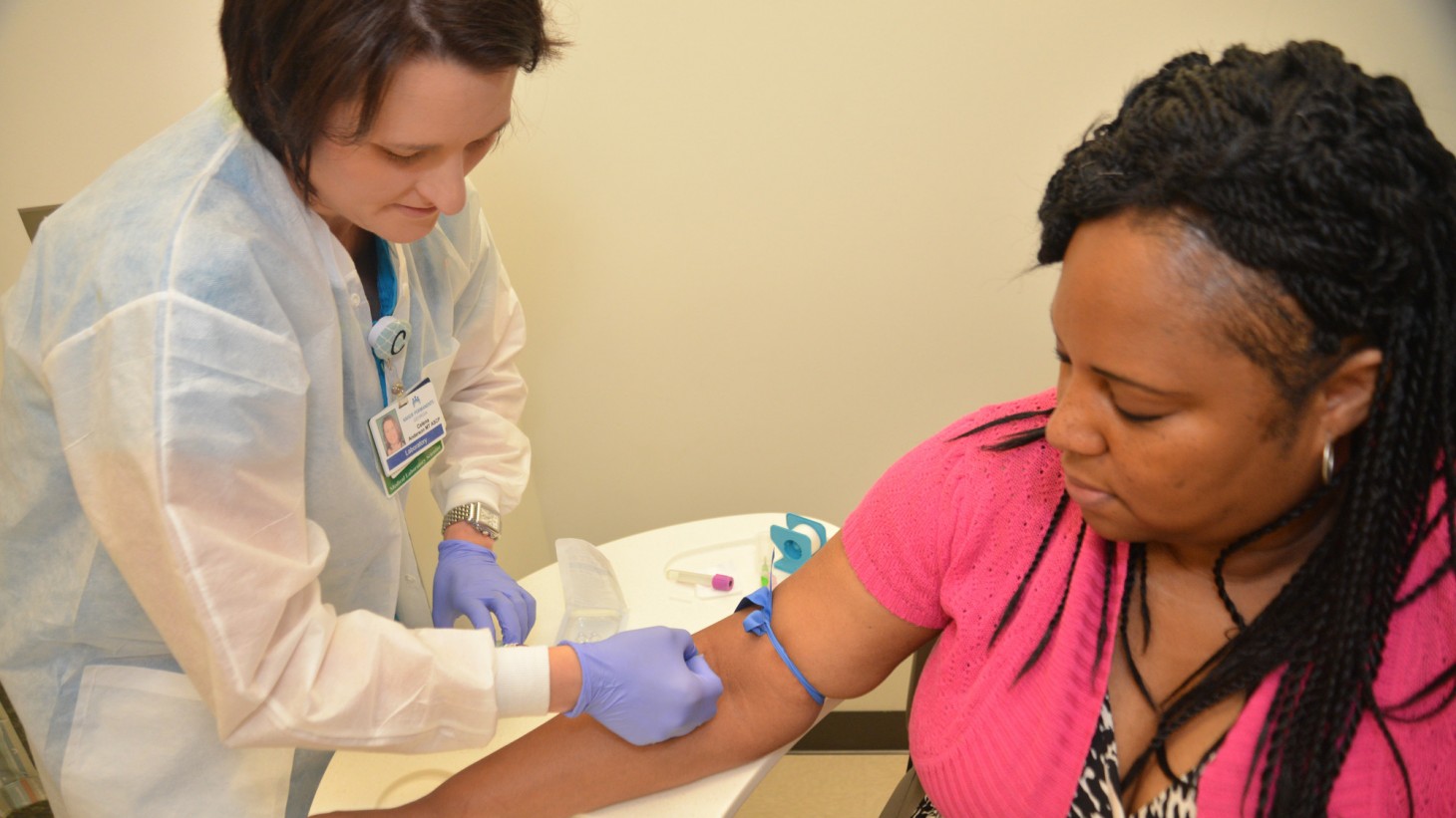 Laboratory Medical Technologist Celena Anderson and patient Magnolia Ramey.